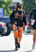 Vanessa Hudgens stands out in tie-dye joggers while stopping for a post-workout drink at Earthbar in West Hollywood, California
