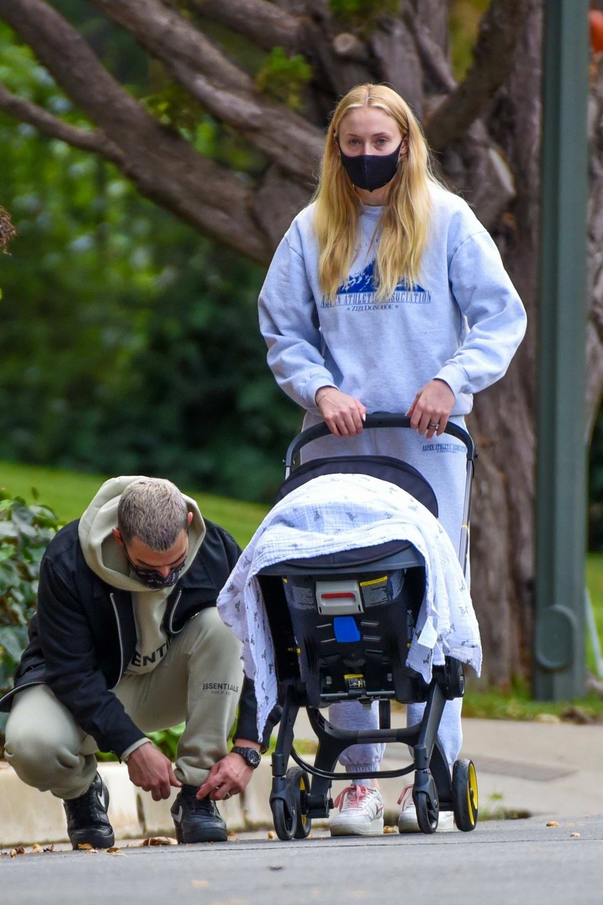 Sophie Turner, Joe Jonas, and Daughter Willa Step Out for a Walk