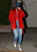 Rihanna looks striking in red as she makes a swift exit after dinner at Giorgio Baldi in Santa Monica, California