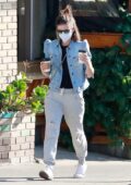 Kate Mara wears grey sweatpants and paired with a denim jacket while out on a coffee run in Los Feliz, California