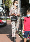 Alessandra Ambrosio looks stylish in a patterned jumpsuit as she takes her kids out for lunch in Pacific Palisades, California