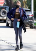 Kaia Gerber displays long legs in grey leggings while attending another Pilates class in West Hollywood, California