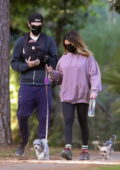 Ashley Tisdale and Christopher French take a walk with their newborn daughter and two dogs in Los Feliz, California