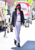 Bella Hadid goes shopping and brings flowers for Gigi's 26th birthday in New York City