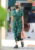 Jennifer Lawrence looks lovely in a green spring dress as she steps out in Tribeca, New York