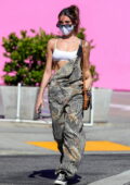 Madison Beer looks cute in camo overalls and a white sports bra while out for late lunch in West Hollywood, California