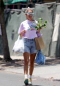 Chantel Jeffries is all smiles as she picks up a new plant while out shopping at the Farmers Market in West Hollywood, California