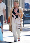 Hilary Duff is all smiles as she steps for shopping with her family in Los Angeles