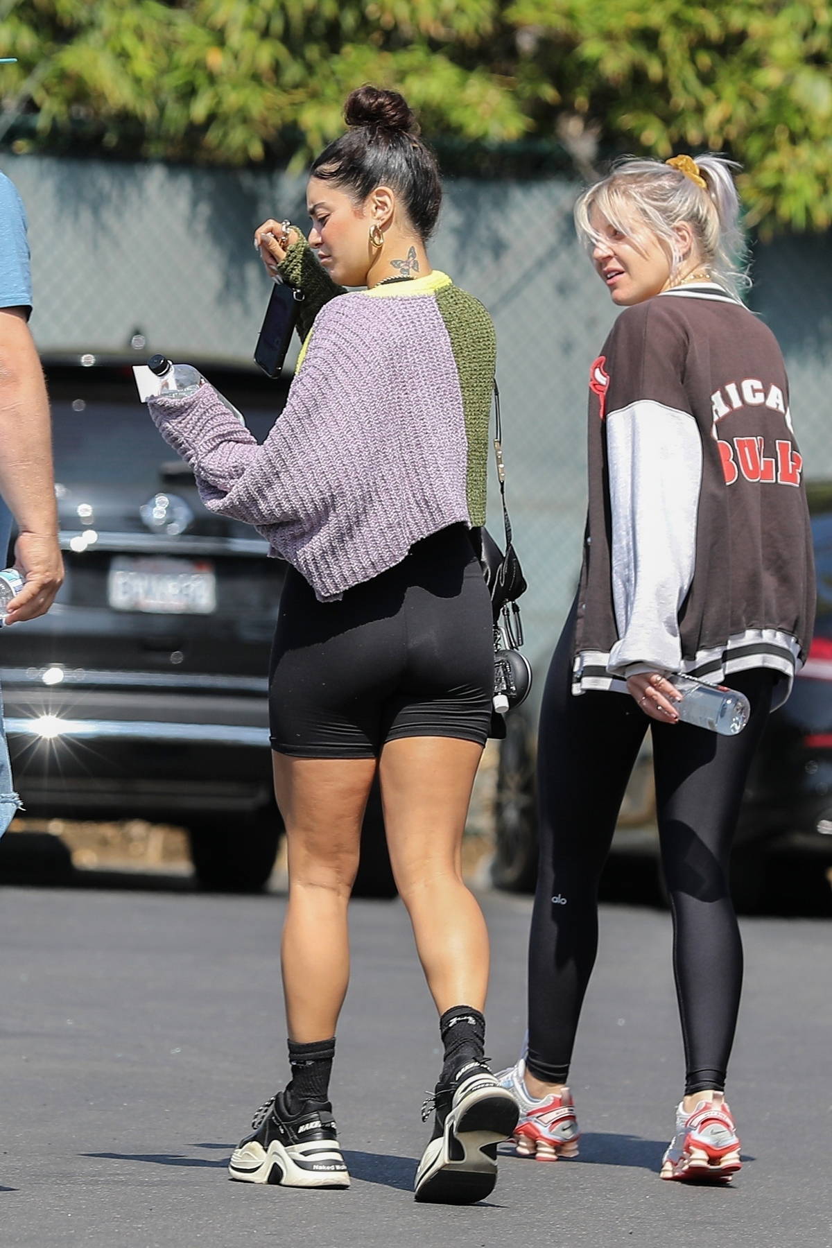 vanessa hudgens sports black workout top and legging shorts as she