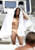 Michelle Rodriguez spotted in a peach bikini while relaxing on a yacht in Sardinia, Italy