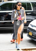 Dua Lipa looks trendy in a striped side-slit dress while heading out with boyfriend Anwar Hadid in New York City