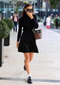 Irina Shayk looks super chic in a black dress while arriving for Versace SS22 show during Milan Fashion Week in Milan, Italy