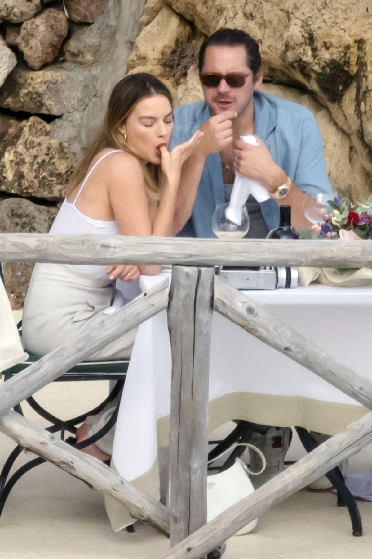 Margot Robbie and husband Tom Ackerley pack on the PDA during a