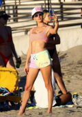 Alessandra Ambrosio displays her flawless figure during a game of beach volleyball with friends in Santa Monica, California