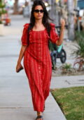 Camila Cabello seen wearing a red dress while out on a shopping trip on Melrose in Los Angeles