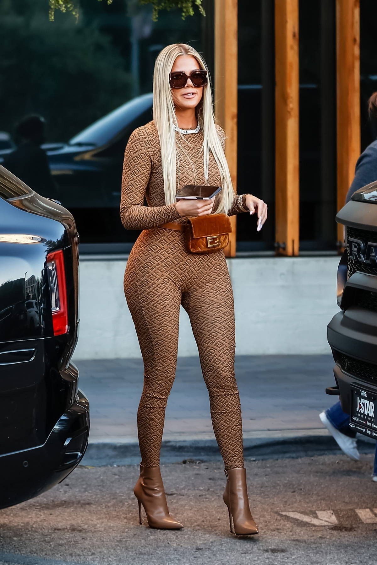 khloe kardashian flaunts her curves in fendi x skims bodysuit while filming  at joey in woodland hills, california-111021_9