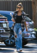 Alessandra Ambrosio carries her huge 'Alessandra by Stewart Shining' hardcover book ahead of a business meeting in Los Angeles