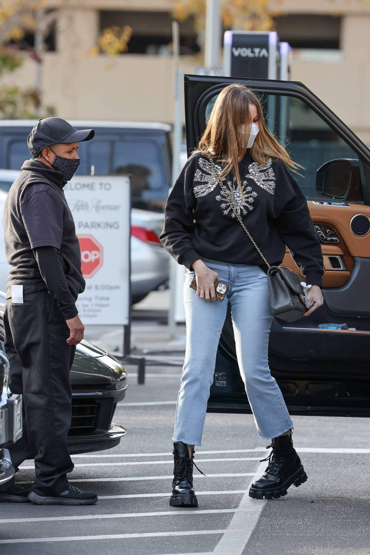 sofia vergara wears a black sweater with skin-tight jeans as she