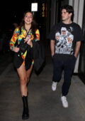 Tate McRae gets leggy in a colorful minidress while out for dinner at Catch LA in West Hollywood, California