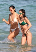 Chantel Jeffries and Cindy Kimberly slip into their bikinis while enjoying a sunny day at the beach in Miami, Florida