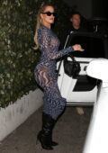 Khloe Kardashian flaunts her curves in a sheer body-hugging dress while out for dinner in West Hollywood, California