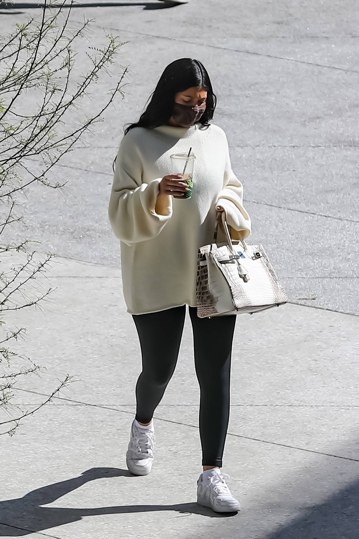 kylie jenner keeps it cozy in an oversized sweater and leggings