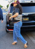 Rihanna shows her growing baby bump while shopping for baby clothes and toys at Kitson in Los Angeles