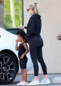 Khloe Kardashian sports a black hoodie and leggings as she takes daughter to gymnastics class in Los Angeles