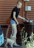 Erin Moriarty puts on a leggy display during a lunch outing with Antony Starr at Kings Road Cafe in West Hollywood, California