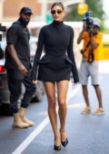 Hailey Bieber looks stunning in a black mini dress while visiting HuffPost in New York City