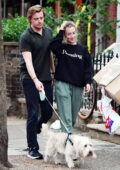 Saoirse Ronan keeps it casual while out for a stroll with boyfriend Jack Lowden and their dog in London, UK