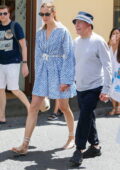 Karlie Kloss looks great in a striped robe dress while out on a stroll with producer David Geffen in Capri, Italy