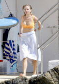 Sienna Miller stuns in an orange bikini while enjoying her vacation with boyfriend Oli Green in the South of France