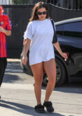 Addison Rae gets leggy in short shorts and an oversized white tee while leaving her Pilates session in West Hollywood, California