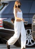 Kaia Gerber keeps it simple in all-white casuals while stopping by at Erewhon market in Calabasas, California
