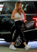 Sofia Vergara dons a white strapless top matching her sneakers and black trousers ahead of a shopping trip in Beverly Hills, California