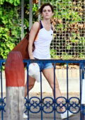 Emma Watson wears a tank top and denim shorts while out in Venice, Italy