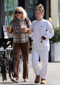 Ashley Tisdale opts for cozy white sweats while out for coffee with her mom in Los Angeles
