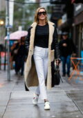 Katie Cassidy looks stylish in white jeans, black top and a leather coat while out in Tribeca, New York City