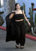 Addison Rae looks good in black crop top with matching trousers while picking up a dress in West Hollywood, California