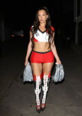 Anastasia Karanikolaou dresses up as a cheerleader while celebrating one more night of Halloween in West Hollywood, California
