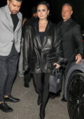 Demi Lovato looks chic in all black while attending Ashley Benson's dinner event at Catch Steak in West Hollywood, California