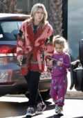 Hilary Duff stays cozy in a colorful coat while stepping out with her family in Studio City, California