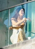Kendall Jenner looks stunning during a photoshoot on a balcony in the Hollywood Hills, California