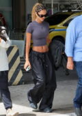 Juliana Nalu displays her midriff as she touches down in Rio de Janeiro, Brazil