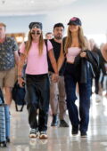 Chrishell Stause and girlfriend G Flip hold hands as they arrive at Adelaide airport, Australia