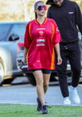 Kim Kardashian dons an oversized jersey top and spandex shorts while attending North's basketball game in Los Angeles