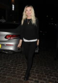 Georgia Toffolo is all smiles as she leaves the Chiltern Firehouse on Valentine's night with a male companion in London, UK