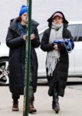 Natalia Dyer is all bundled while out for lunch with a friend in New York City