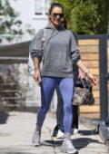 Alessandra Ambrosio displays her toned legs in lavender leggings as she leaves after her daily workout in Beverly Hills, California